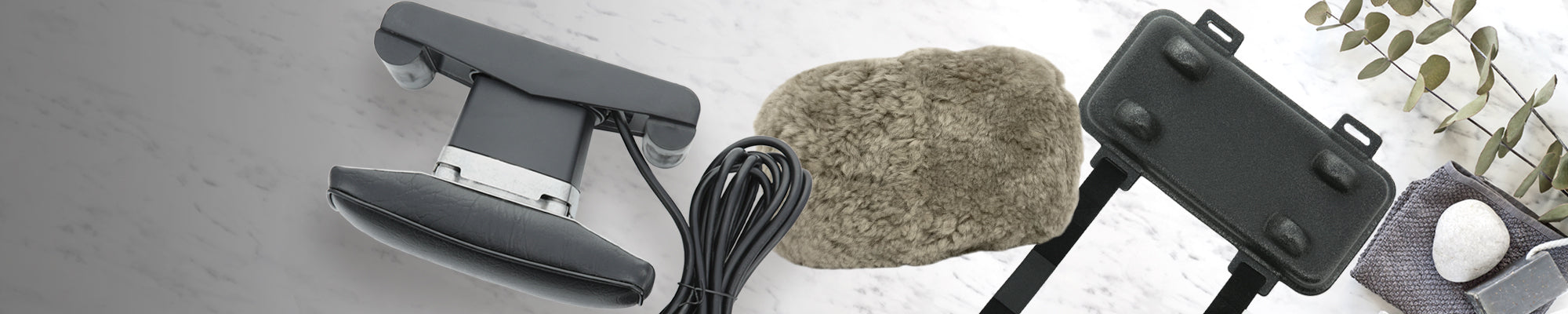 Core Products Jeanie Rub massager set displayed with accessories on a neutral surface, including the sheepskin cover and paraspinal accessory; no visible text