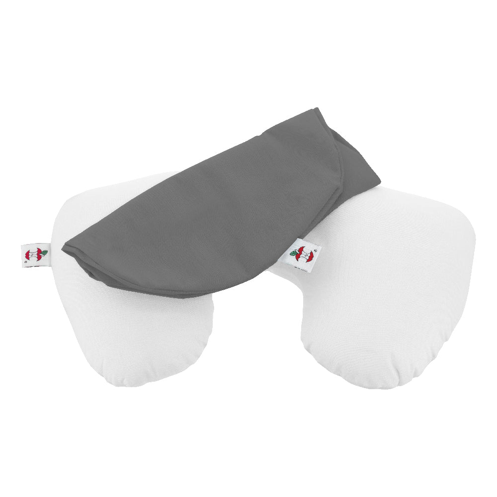 Core Products gray pillowcase designed to fit the Travel Core Pillow, shown folded and laying on top of the white Travel Core Pillow. The case provides a clean, protective cover for the Travel Core Pillow, and features a visible tag with the Core Products apple logo for brand identification.
